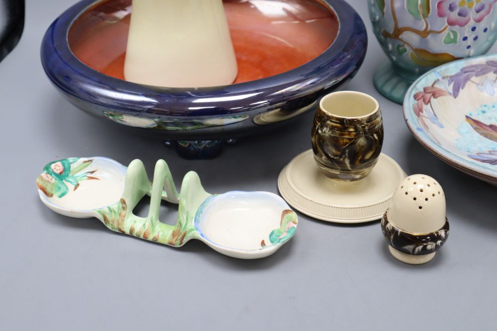 Seven pieces of art pottery to include Clarice Cliff, McIntyre and Crown Devon